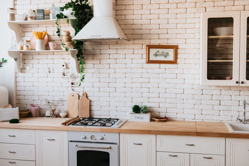 A Clean Kitchen with White Bricks